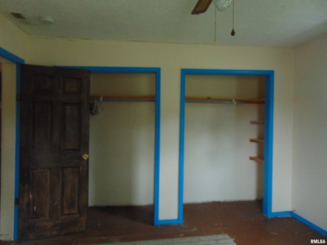 15321 Cherry St, Carterville, IL 62918 - unfurnished bedroom featuring two closets and ceiling fan