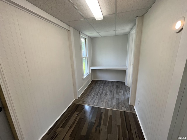 212 S E St, Cambridge, IL 61238 - spare room featuring dark wood-style floors and a paneled ceiling