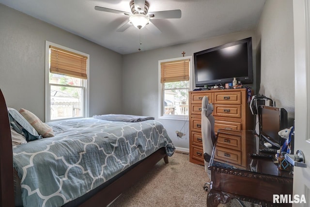 2410 Barker St, Clinton, IA 52732 - bedroom featuring carpet flooring and ceiling fan