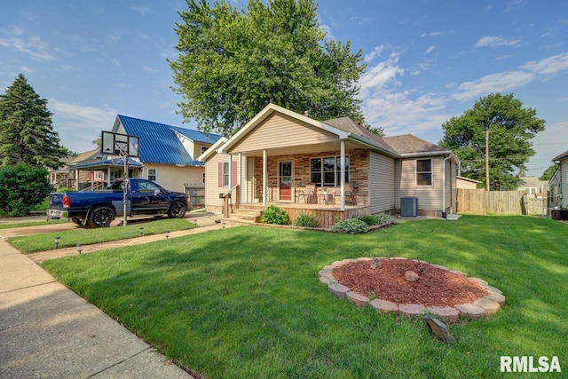 2410 Barker St, Clinton, IA 52732 - ranch-style home featuring covered porch and stone siding