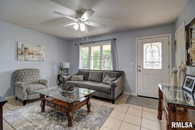 2410 Barker St, Clinton, IA 52732 - living area featuring ceiling fan and light tile patterned floors