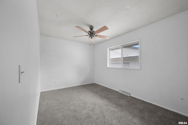 409 W 30th Ave, Milan, IL 61264 - carpeted spare room featuring a ceiling fan and baseboards