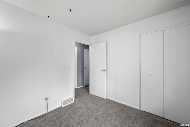 409 W 30th Ave, Milan, IL 61264 - unfurnished bedroom with carpet and baseboards