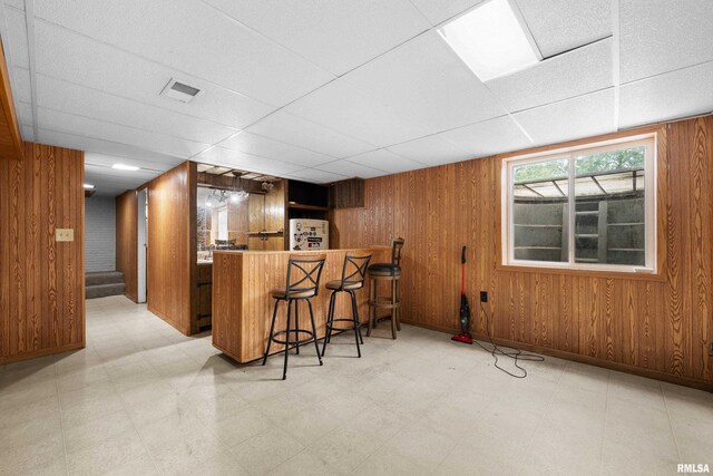 409 W 30th Ave, Milan, IL 61264 - indoor bar featuring light floors, wooden walls, and a drop ceiling