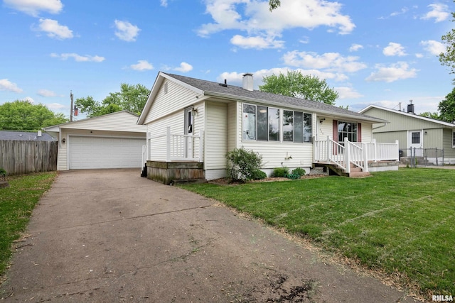409 W 30th Ave, Milan, IL 61264 - ranch-style home with an outdoor structure, a detached garage, and a chimney