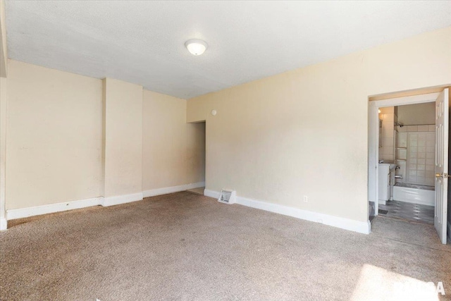 1045-1047 12th St, Rock Island, IL 61201 - carpeted spare room with baseboards