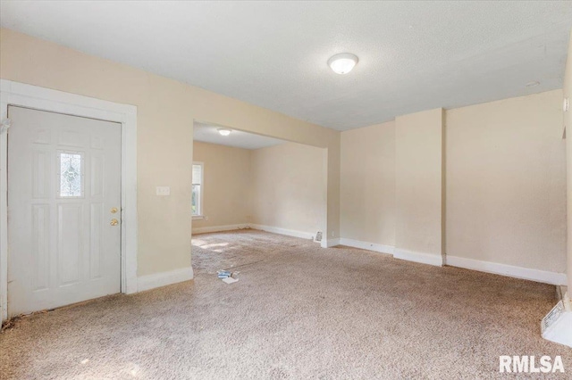1045-1047 12th St, Rock Island, IL 61201 - entryway featuring carpet flooring