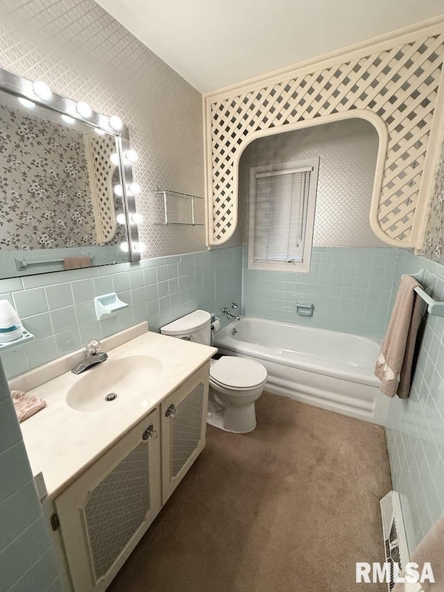 1701 Julianne Dr, Marion, IL 62959 - bathroom with tile walls, a garden tub, vanity, and a wainscoted wall