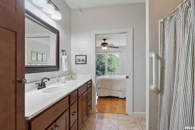 1237 Kimberly Rd, Bettendorf, IA 52722 - full bath featuring tile patterned flooring, vanity, ensuite bath, and a ceiling fan