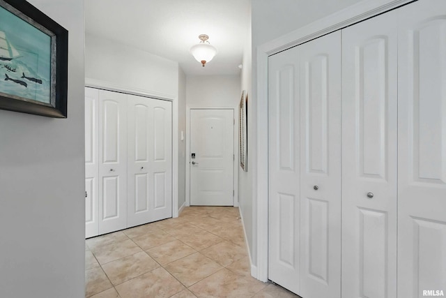 1237 Kimberly Rd, Bettendorf, IA 52722 - hall with light tile patterned flooring
