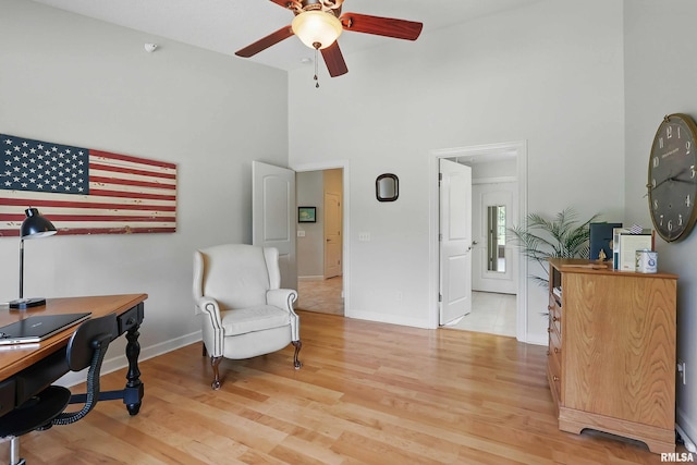 1237 Kimberly Rd, Bettendorf, IA 52722 - office space featuring a towering ceiling, ceiling fan, and light wood finished floors