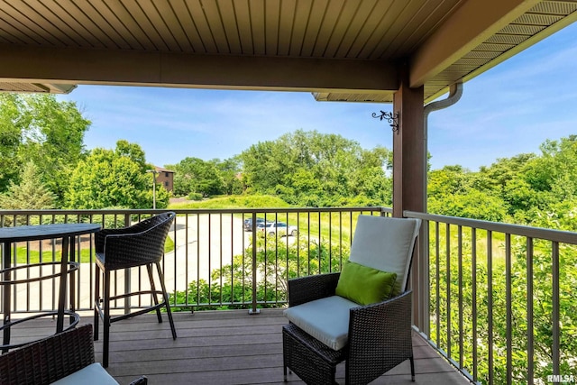 1237 Kimberly Rd, Bettendorf, IA 52722 - wooden terrace featuring view of scattered trees