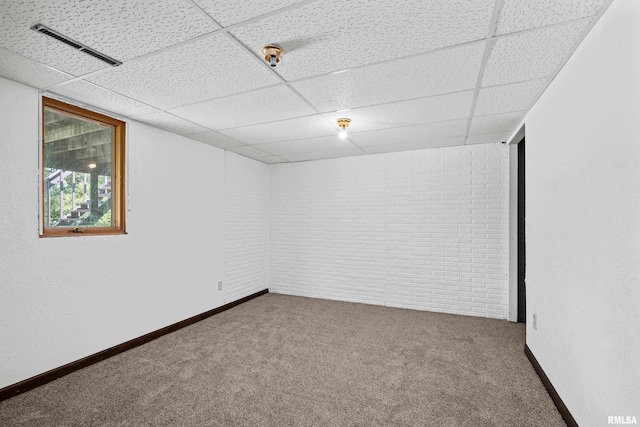 3796 160th St, Bryant, IA 52727 - basement with a paneled ceiling and carpet