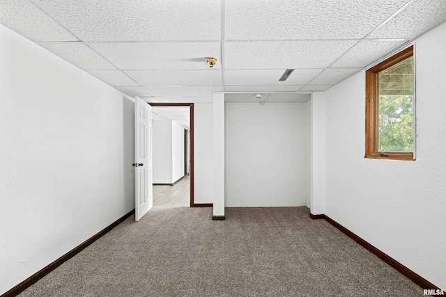 3796 160th St, Bryant, IA 52727 - below grade area featuring carpet flooring and a drop ceiling