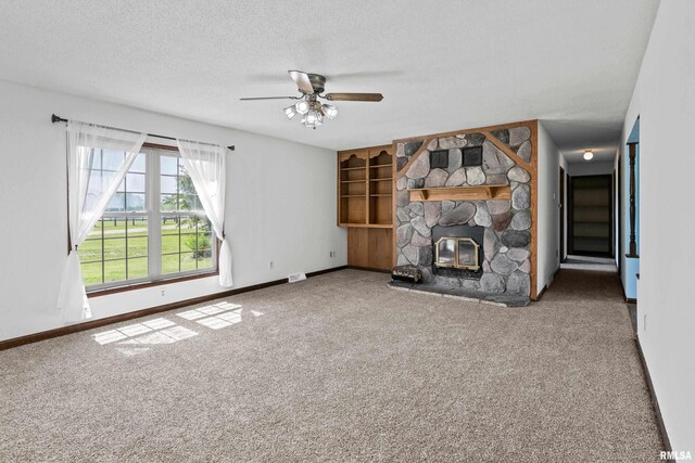 3796 160th St, Bryant, IA 52727 - unfurnished living room featuring carpet floors, a textured ceiling, and ceiling fan