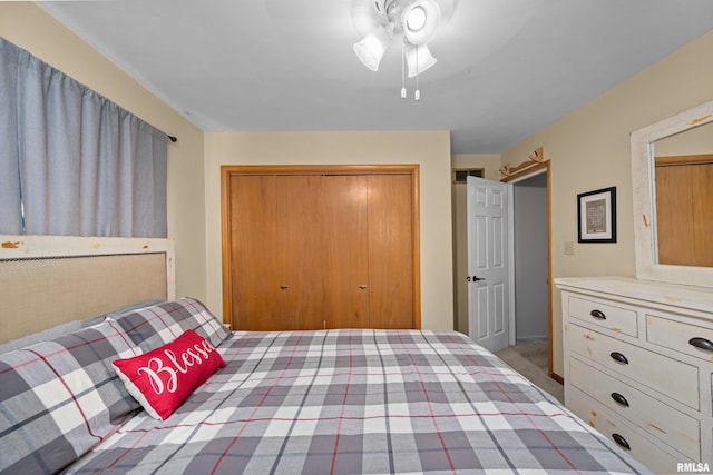 404 34th Ave, East Moline, IL 61244 - bedroom with a closet and a ceiling fan