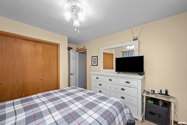 404 34th Ave, East Moline, IL 61244 - bedroom with a closet and ceiling fan