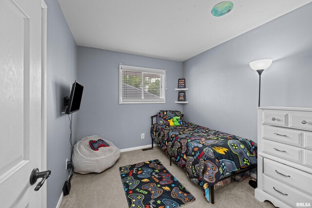 404 34th Ave, East Moline, IL 61244 - bedroom featuring carpet and baseboards