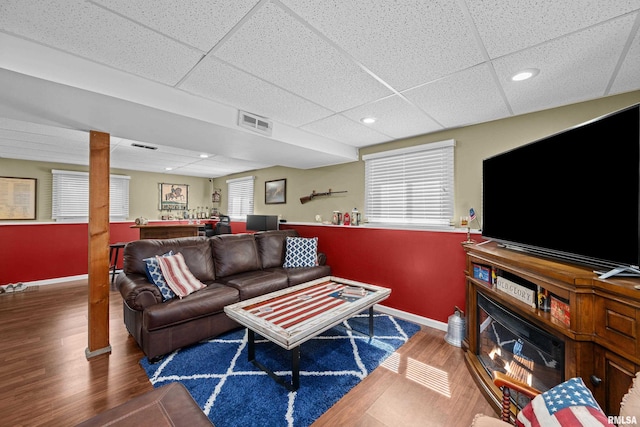404 34th Ave, East Moline, IL 61244 - living area with wood finished floors, a drop ceiling, and recessed lighting