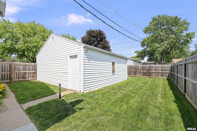 404 34th Ave, East Moline, IL 61244 - fenced backyard with an outbuilding