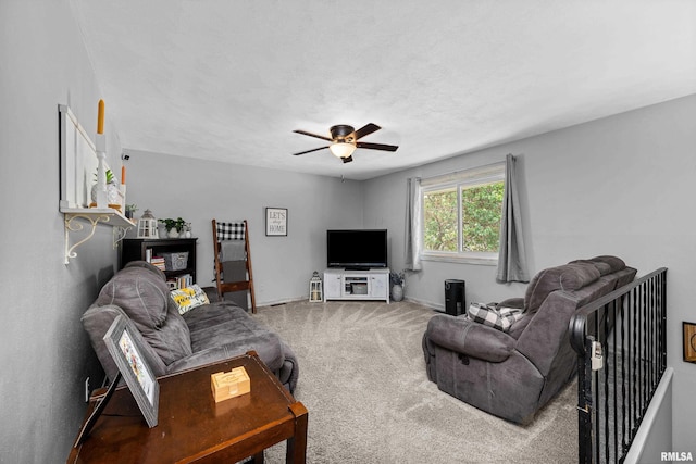 404 34th Ave, East Moline, IL 61244 - living room featuring ceiling fan and carpet