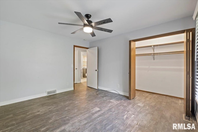 4319 7th Ave, Moline, IL 61265 - unfurnished bedroom with wood finished floors, a closet, and a ceiling fan