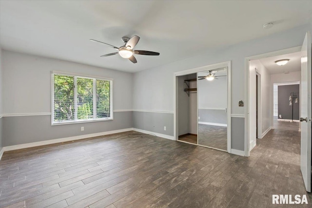 4319 7th Ave, Moline, IL 61265 - unfurnished bedroom with wood finished floors, a closet, and a ceiling fan
