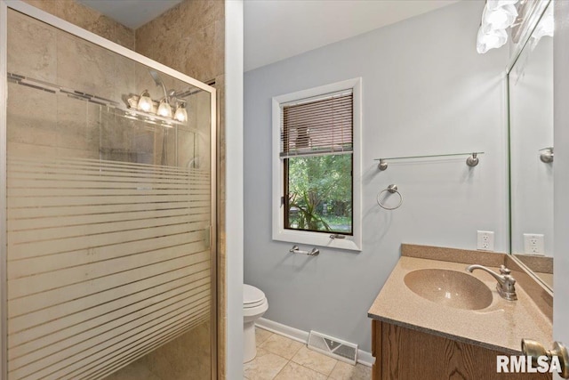 4319 7th Ave, Moline, IL 61265 - full bathroom featuring vanity, a shower stall, and tile patterned floors