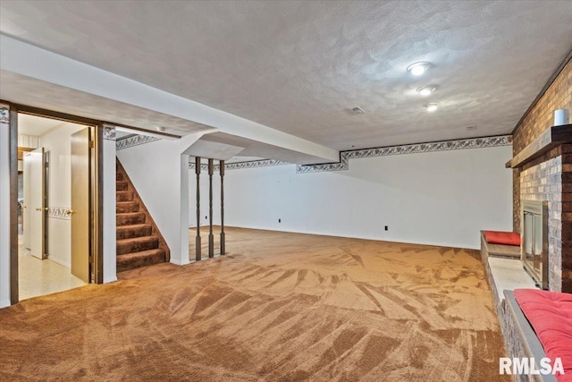 4319 7th Ave, Moline, IL 61265 - finished basement with carpet floors, stairs, and a brick fireplace