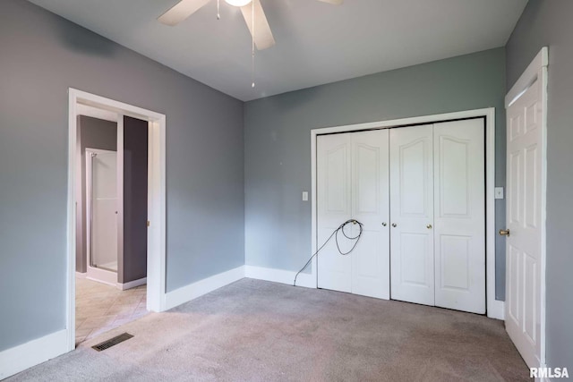 614 S Calumet St, Marion, IL 62959 - unfurnished bedroom with carpet floors, a closet, and a ceiling fan