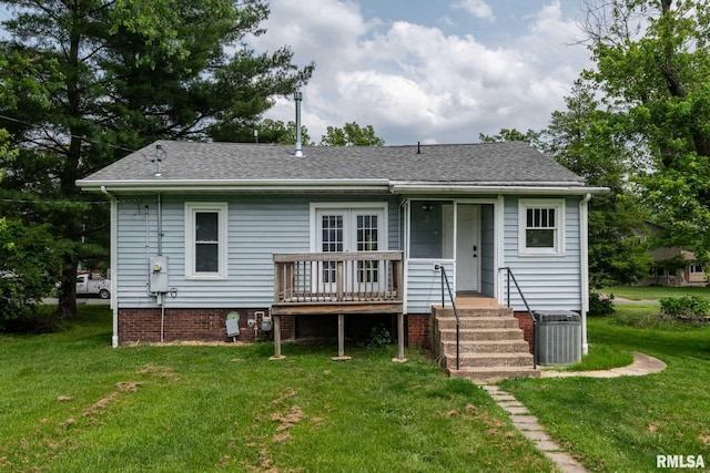 614 S Calumet St, Marion, IL 62959 - rear view of house with a lawn and roof with shingles