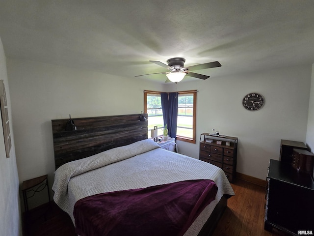 610 NW 6th St, Aledo, IL 61231 - bedroom featuring dark wood-type flooring and a ceiling fan