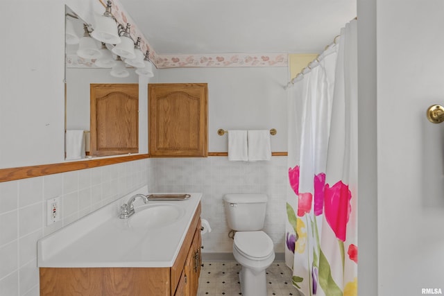 3626 15th Avenue Ct, Moline, IL 61265 - bathroom featuring vanity, wainscoting, a shower with curtain, and tile walls