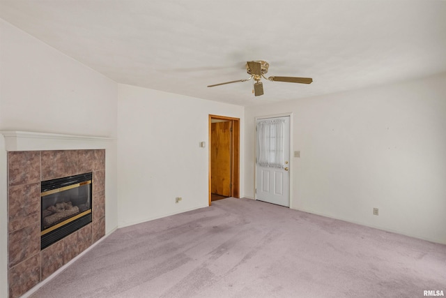 3626 15th Avenue Ct, Moline, IL 61265 - unfurnished living room featuring a fireplace, carpet flooring, and a ceiling fan