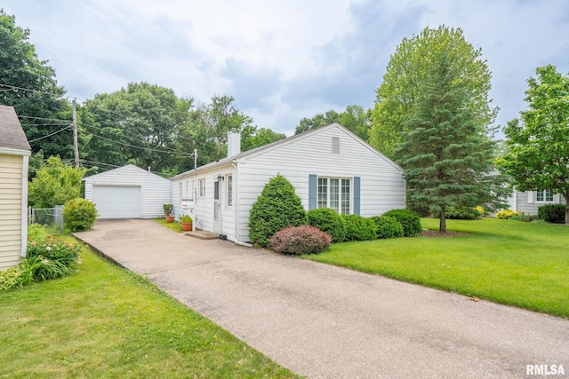 3626 15th Avenue Ct, Moline, IL 61265 - view of front of house with an outbuilding, a detached garage, a front yard, and a chimney