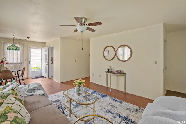 3626 15th Avenue Ct, Moline, IL 61265 - living area with a ceiling fan and wood finished floors