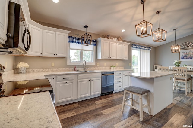 101 Prairie View Ct, Clinton, IA 52732 - kitchen with dishwasher, electric range, plenty of natural light, a chandelier, and recessed lighting