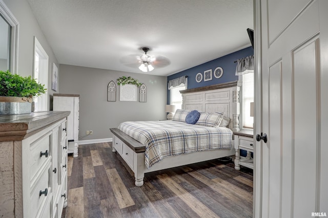 101 Prairie View Ct, Clinton, IA 52732 - bedroom featuring multiple windows, dark wood finished floors, and ceiling fan