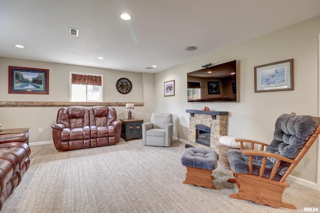 101 Prairie View Ct, Clinton, IA 52732 - living area with carpet, recessed lighting, and a stone fireplace