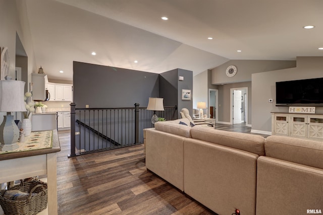 101 Prairie View Ct, Clinton, IA 52732 - living area with dark wood-style flooring, vaulted ceiling, and recessed lighting
