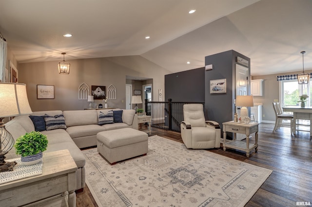 101 Prairie View Ct, Clinton, IA 52732 - living room featuring a chandelier, vaulted ceiling, dark wood-type flooring, and recessed lighting