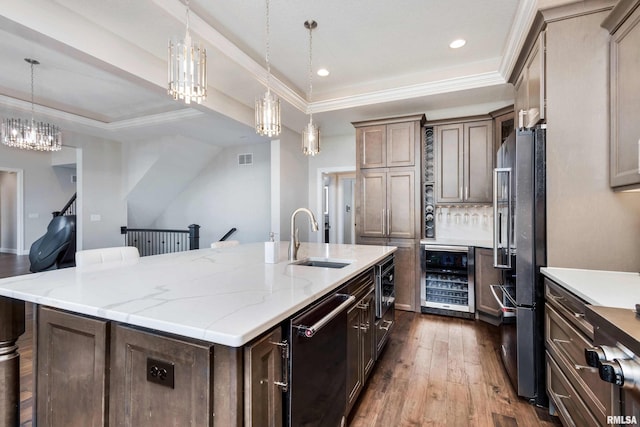 5541 Pigeon Creek Rd, Bettendorf, IA 52722 - kitchen with beverage cooler, stainless steel fridge with ice dispenser, dishwasher, a large island, and dark wood-style flooring