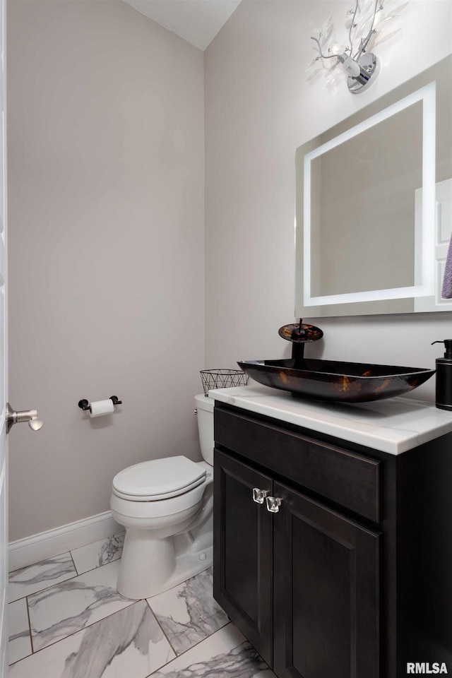 5541 Pigeon Creek Rd, Bettendorf, IA 52722 - bathroom featuring marble finish flooring and vanity