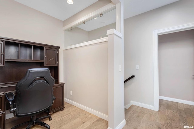 5541 Pigeon Creek Rd, Bettendorf, IA 52722 - home office featuring light wood-type flooring and baseboards