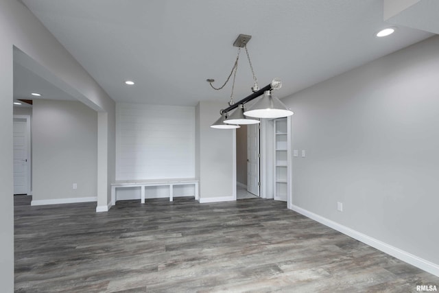 5541 Pigeon Creek Rd, Bettendorf, IA 52722 - unfurnished dining area with wood finished floors and recessed lighting