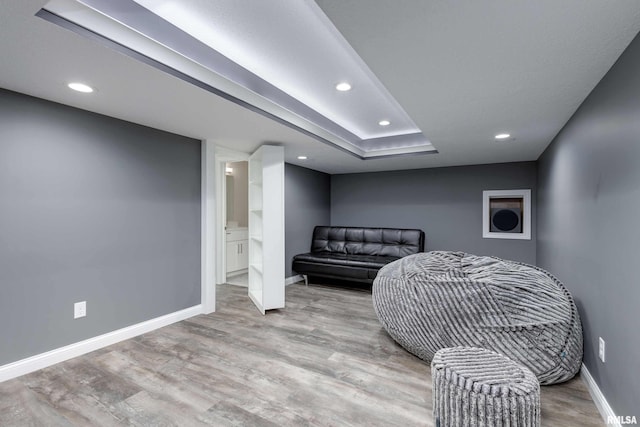 5541 Pigeon Creek Rd, Bettendorf, IA 52722 - sitting room featuring wood finished floors and recessed lighting