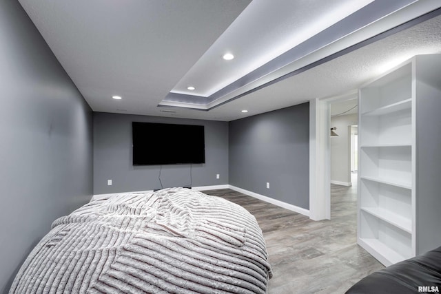 5541 Pigeon Creek Rd, Bettendorf, IA 52722 - bedroom featuring wood finished floors and recessed lighting