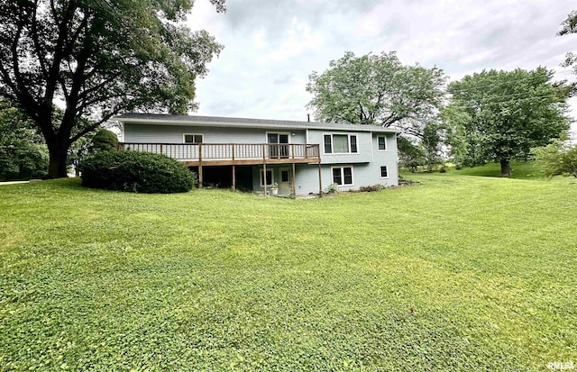 3770 153rd St, Blue Grass, IA 52726 - back of property with a wooden deck and a lawn