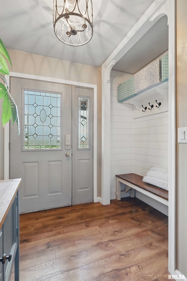 3770 153rd St, Blue Grass, IA 52726 - foyer entrance featuring wood finished floors and a chandelier