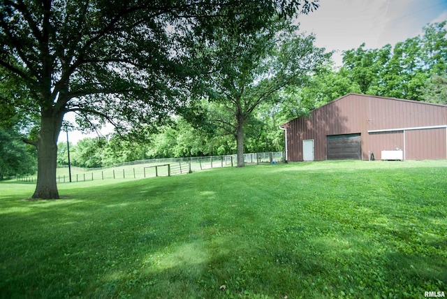 3770 153rd St, Blue Grass, IA 52726 - view of yard with a pole building, a detached garage, an outbuilding, and driveway